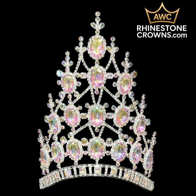 The Kimmy Series - 8.5" Crown is a tall, ornate rhinestone crown with large oval iridescent gems in an intricate lattice, perfect as a dance crown, shown on a black background with the AWC Rhinestone Crowns logo in the top right corner.