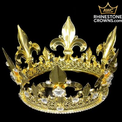 The Cash Series-4.5"x 6.5"-Gold crown features large fleur-de-lis accents, sparkling rhinestones, and intricate gold detailing on a black background. The AWC Rhinestone Crowns logo is in the top right. Ideal for pageants or dance competitions.