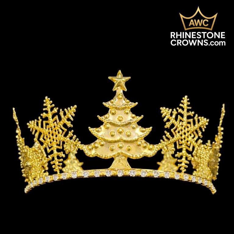 The Golden Winter Wonderland-Fully Round Crown features a gold design with a central Christmas tree, two large snowflakes, and sparkling rhinestones. “AWC RHINESTONECROWNS.com” and a crown logo are in the top right corner.