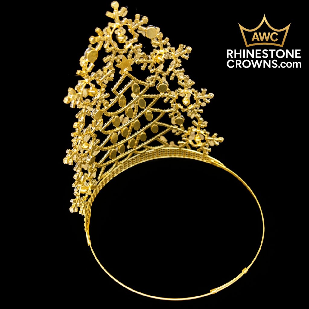 The Jingle All The Way Series-Economy 2" Tiara, a gold rhinestone crown with floral and leaf designs, is shown on a black background as the perfect pageant accessory. The AWC RHINESTONE CROWNS.com logo is in the top right corner.